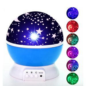 Veilleuse projecteur LED rotatif produisant un ciel étoilé